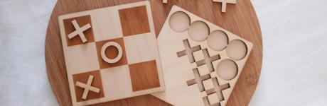 Laser wood cutting used to craft a full wooden tic-tac-toe game